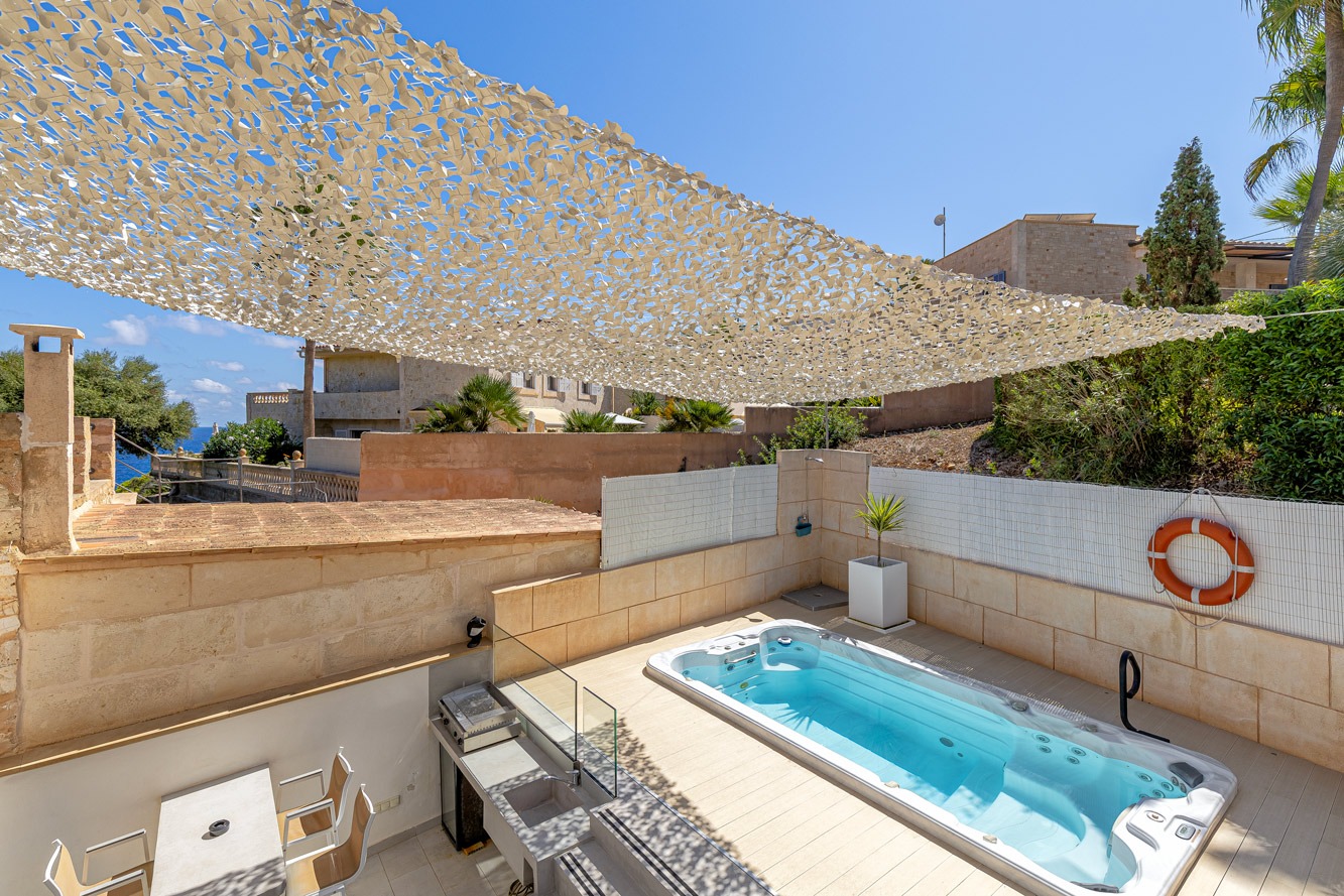 Stadthaus, Cala Llombards