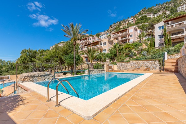 Gemütliche Gartenwohnung mit Teilmeerblick und Tiefgaragenstellplatz