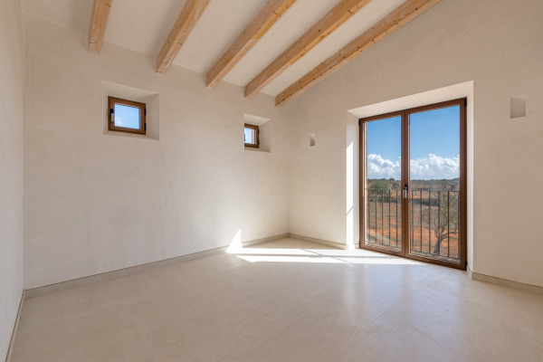 Neugebaute Naturstein-Finca mit Pool bei Ses Salines Bild 10